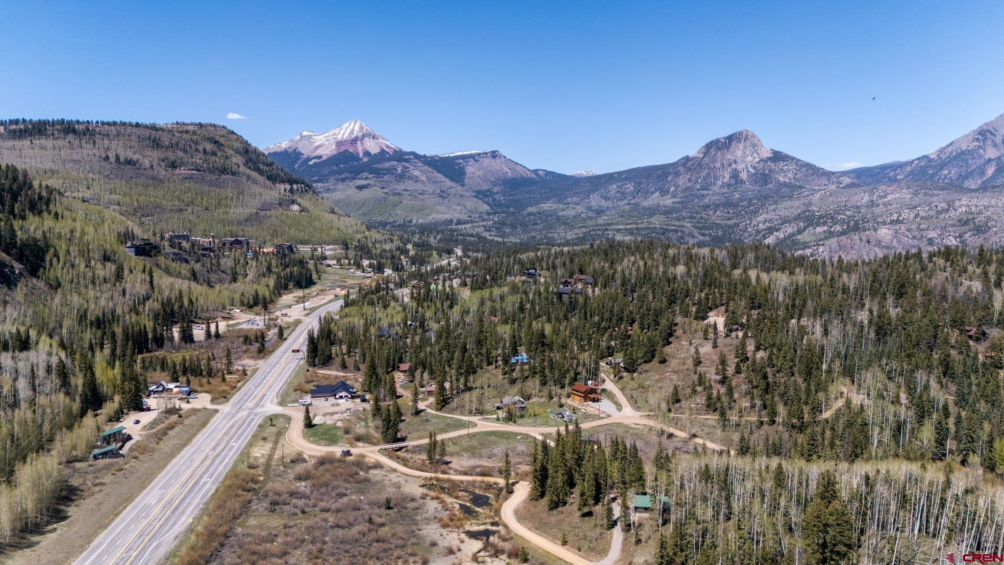 361 Deer Run Way Durango, CO 81301 - Photo 29 of 29 a view of a house with a mountain and mountains in the background