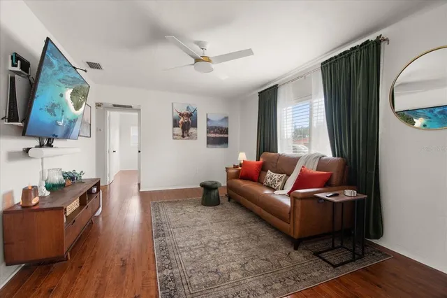 a living room with furniture and a window