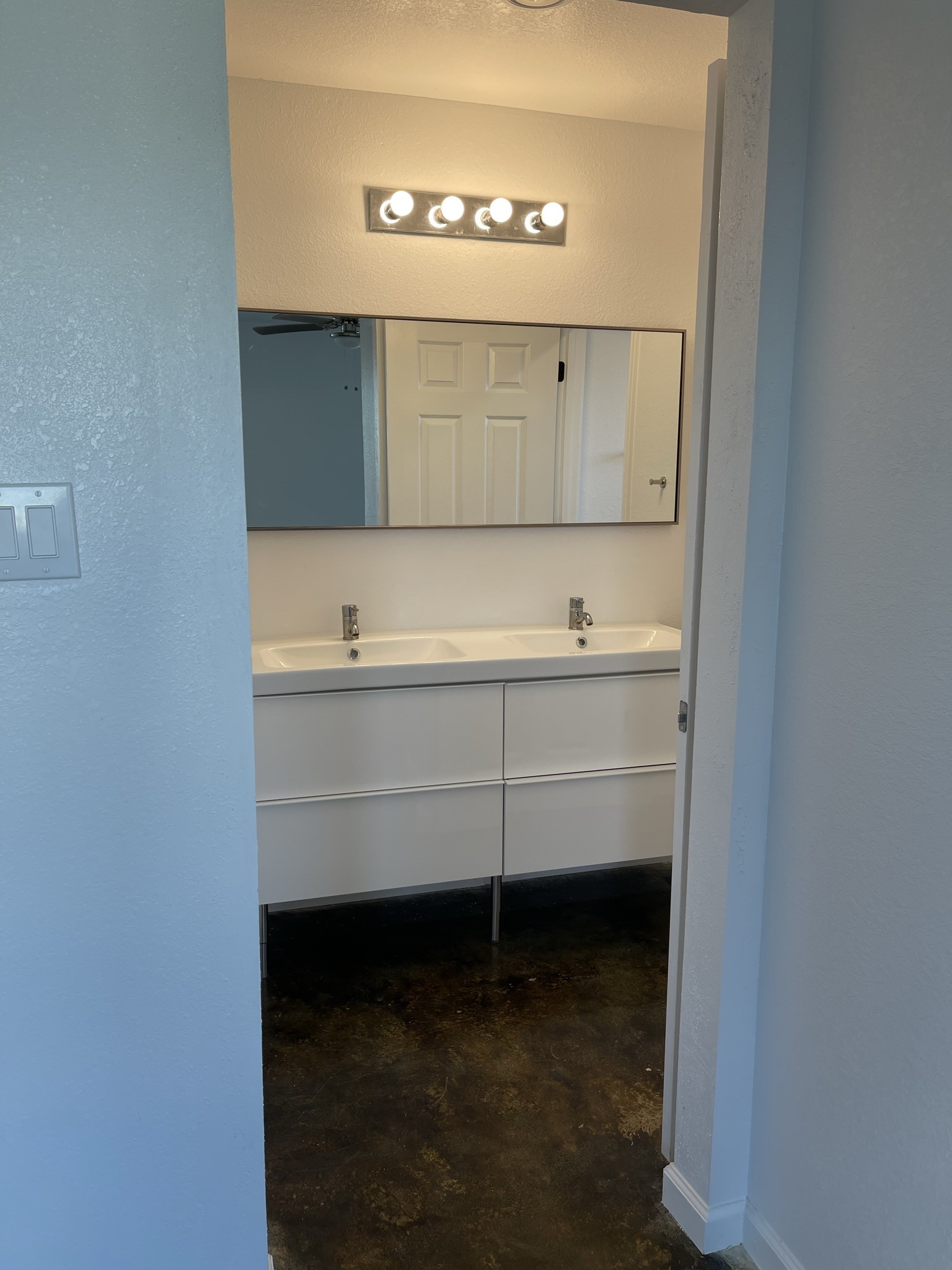 410 Sugar Haven, Unit A Kendleton, TX 77451 - Photo 10 of 13 a bathroom with a bathtub and a sink