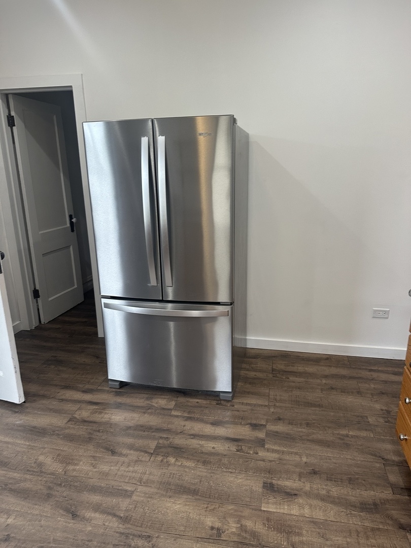 8634 South Carpenter Street Chicago, IL 60620 - Photo 10 of 28 a refrigerator freezer sitting in a kitchen