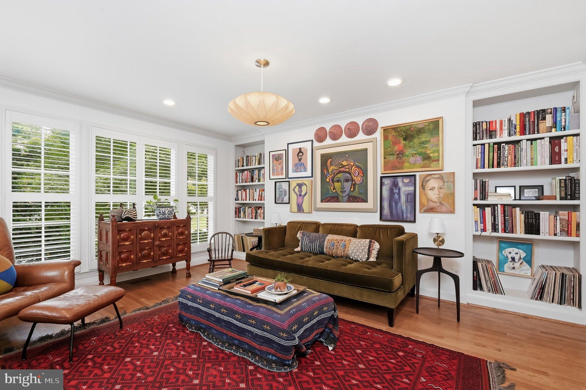 6100 Gloster Road Bethesda, MD 20816 - Photo 19 of 67 Gorgeous family room with built-ins and shutters