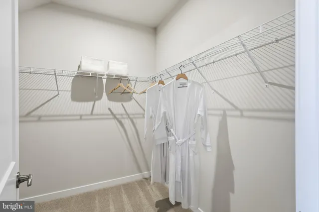 a view of a room with racks on the wall