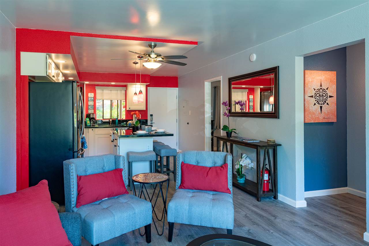 2219 South Kihei Road, Unit B104 Kihei, HI 96753 - Photo 15 of 27 a living room with furniture and a flat screen tv