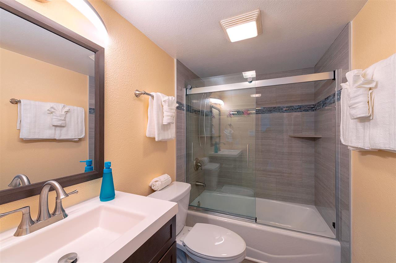 2219 South Kihei Road, Unit B104 Kihei, HI 96753 - Photo 18 of 27 a bathroom with a sink toilet and shower
