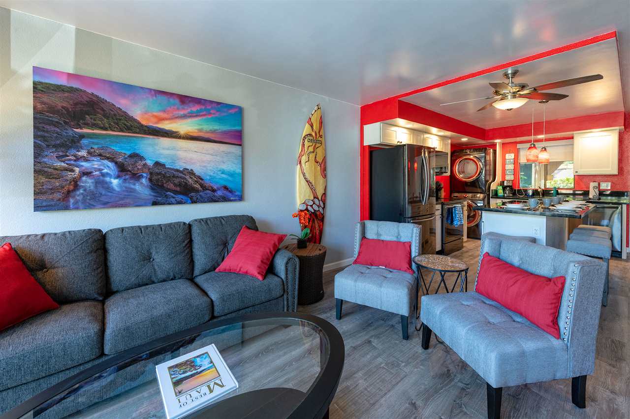 2219 South Kihei Road, Unit B104 Kihei, HI 96753 - Photo 23 of 27 a living room with furniture and a rug