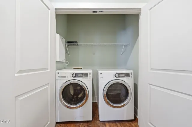 a utility room with dryer and washer