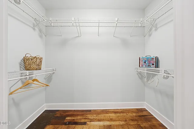 a view of a room with racks on the wall