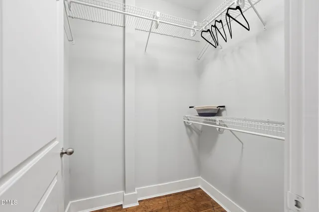 a view of a room with racks on the wall