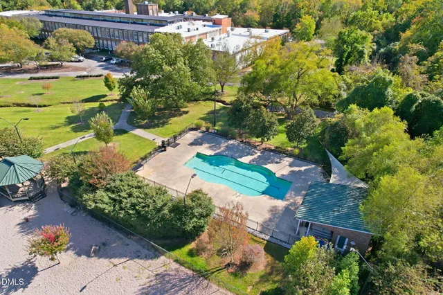 a view of a swimming pool with a patio