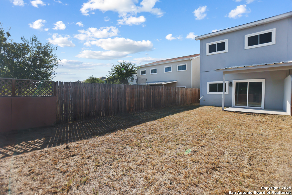 8611 Key Windy Way, Unit 2 Converse, TX 78109 - Photo 26 of 26 a backyard of a house