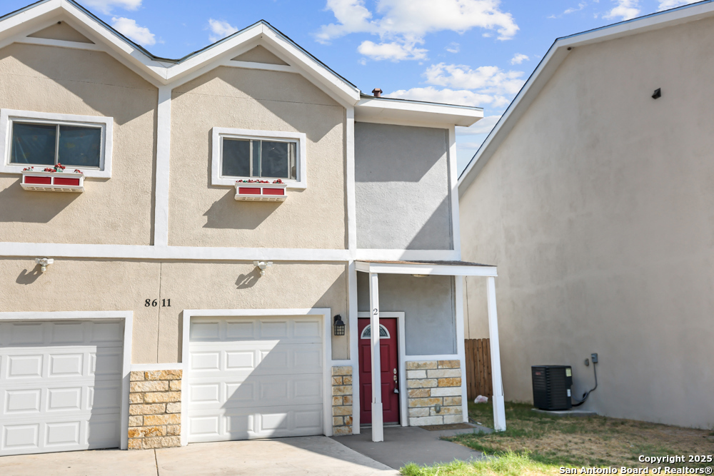 8611 Key Windy Way, Unit 2 Converse, TX 78109 - Photo 4 of 26 a view of a entryway of the house