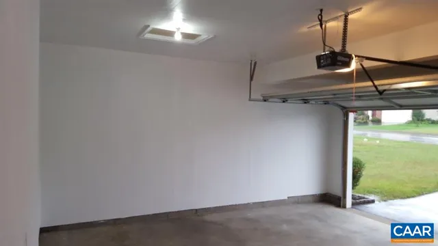 a view of a room with a floor to ceiling window