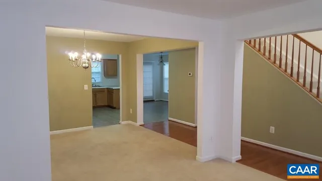 a view of a bathroom with a sink and mirror