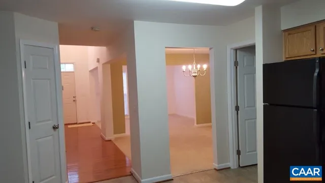 a view of a bathroom from a hallway