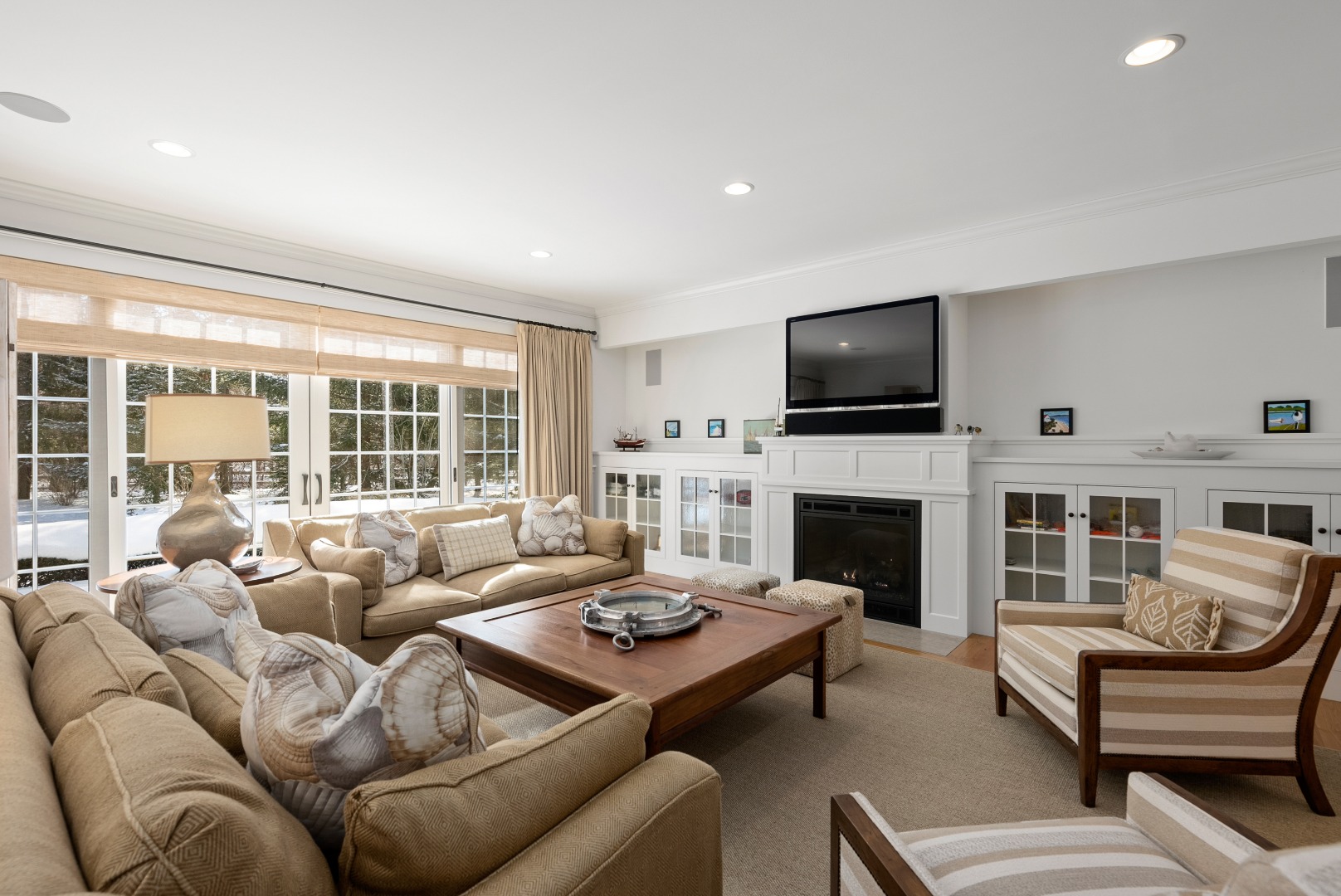 243 Katama Road Edgartown, MA 02539 - Photo 12 of 42 a living room with furniture fireplace and a flat screen tv