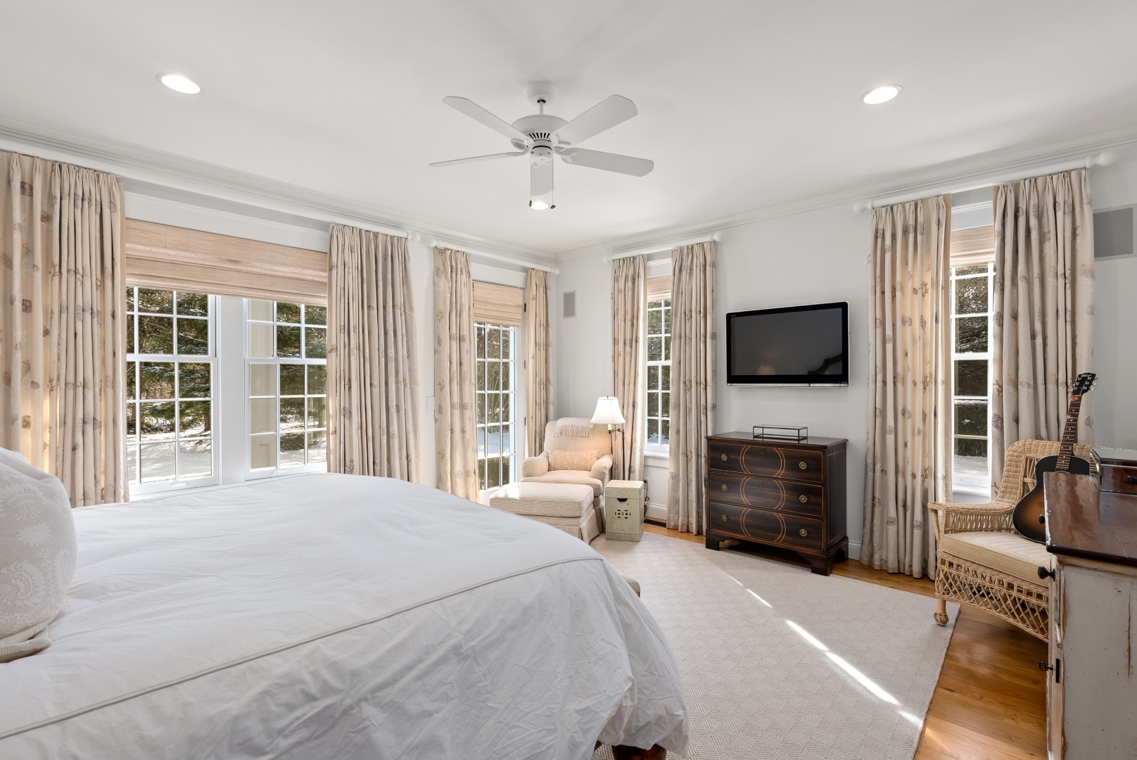 243 Katama Road Edgartown, MA 02539 - Photo 14 of 42 a bedroom with a bed and a flat screen tv