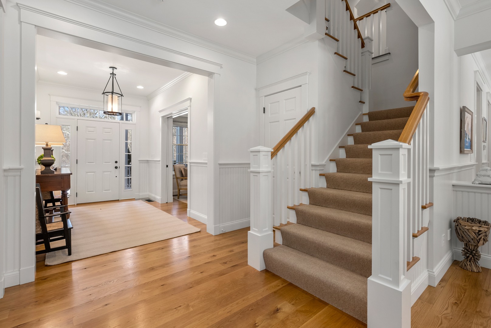 243 Katama Road Edgartown, MA 02539 - Photo 21 of 42 a view of entryway and hall with wooden floor