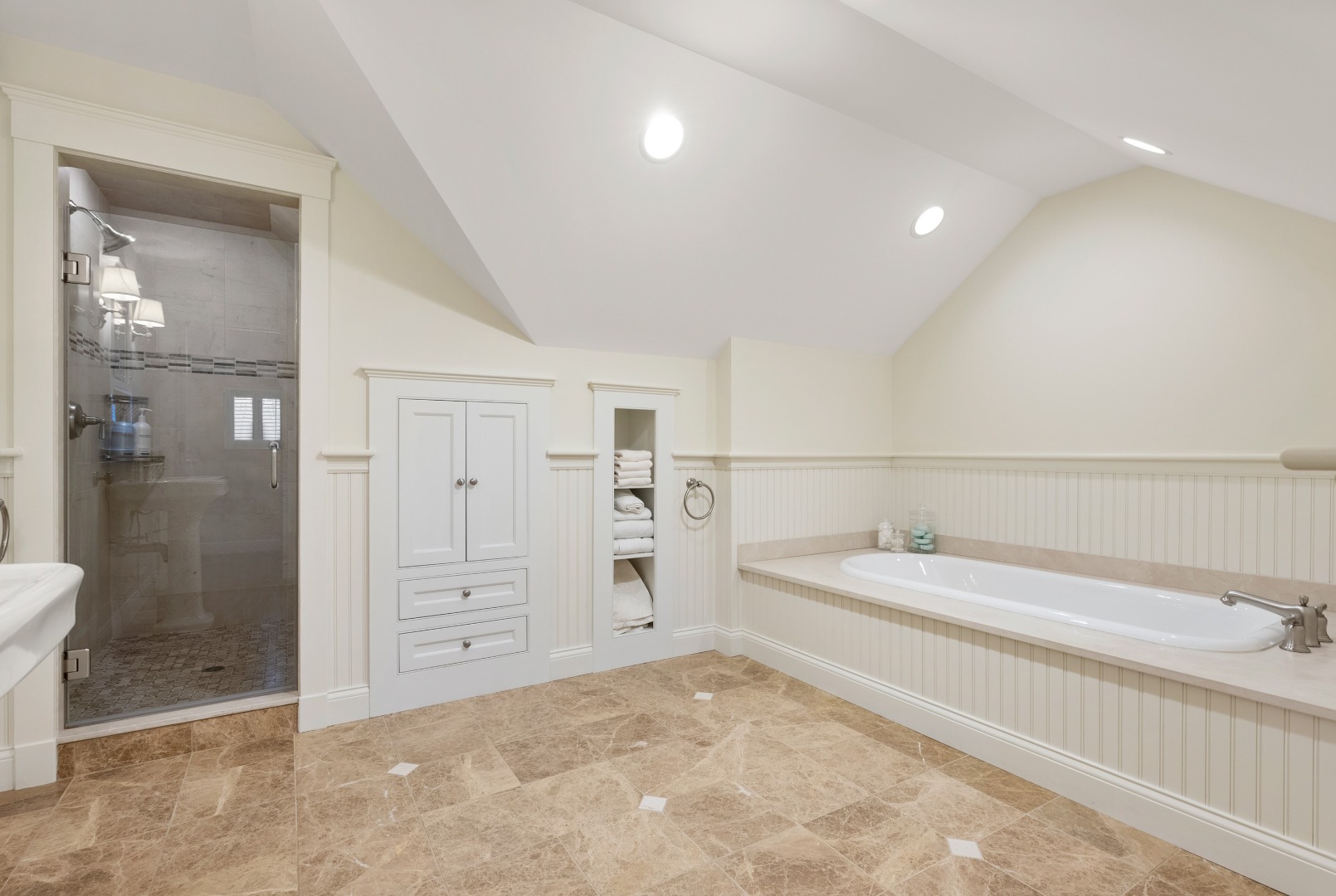 243 Katama Road Edgartown, MA 02539 - Photo 27 of 42 a spacious bathroom with a tub sink and shower