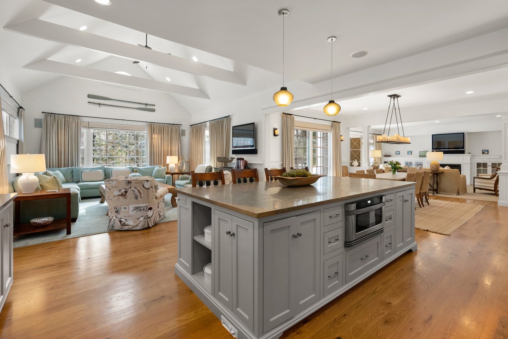 243 Katama Road Edgartown, MA 02539 - Photo 3 of 42 a large kitchen with stainless steel appliances lots of counter space and windows