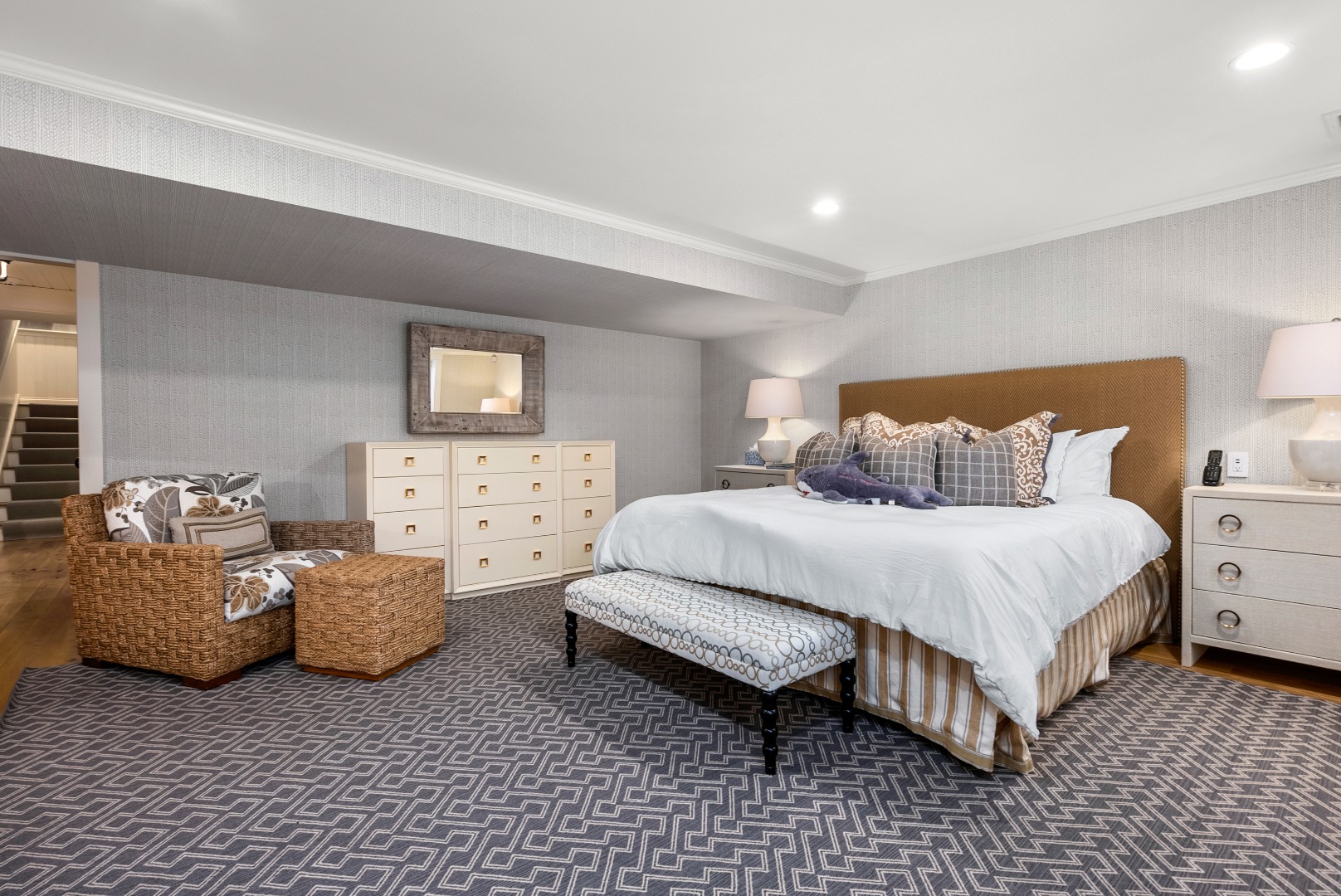 243 Katama Road Edgartown, MA 02539 - Photo 32 of 42 a bedroom with a bed and a couch