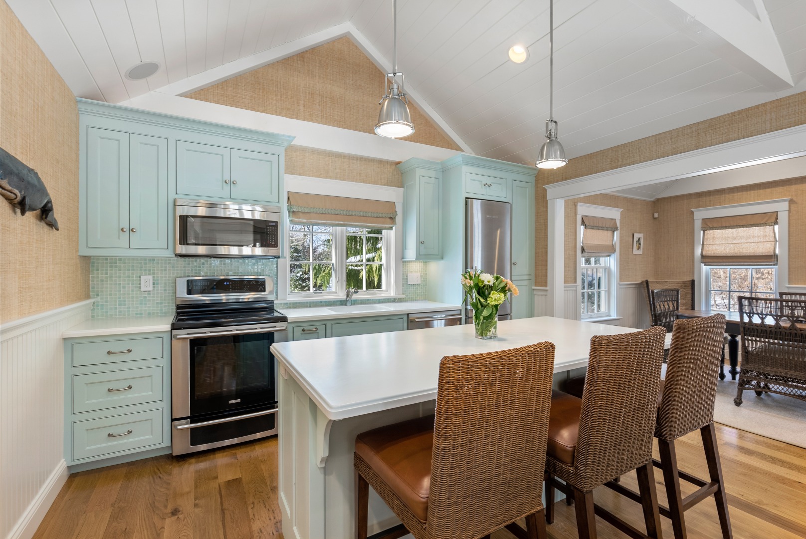 243 Katama Road Edgartown, MA 02539 - Photo 34 of 42 a large kitchen with cabinets table and chairs