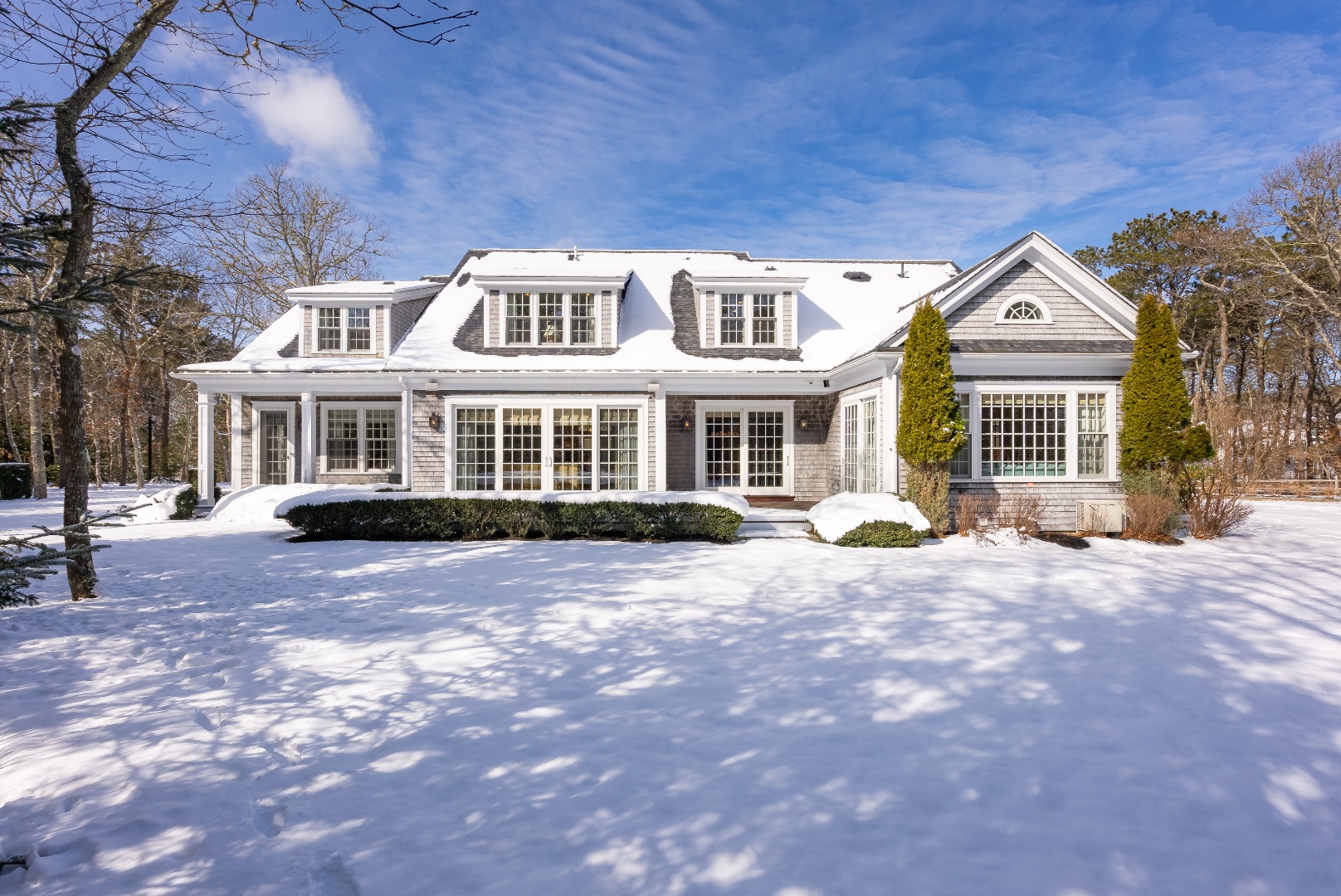 243 Katama Road Edgartown, MA 02539 - Photo 40 of 42 a view of a house with a yard in the background