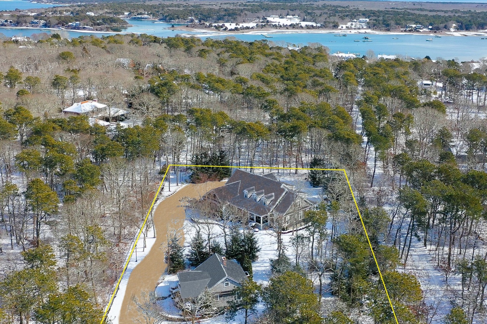 243 Katama Road Edgartown, MA 02539 - Photo 42 of 42 a view of lake with residential houses with outdoor space