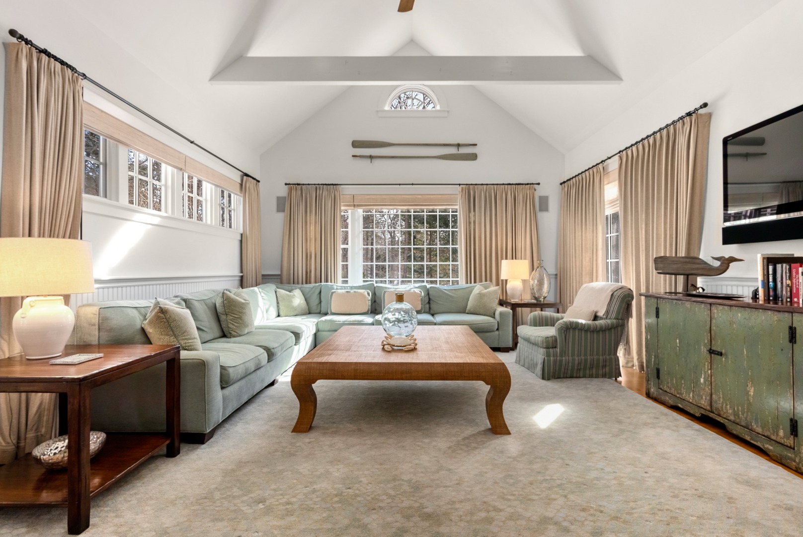 243 Katama Road Edgartown, MA 02539 - Photo 7 of 42 a living room with furniture and a flat screen tv