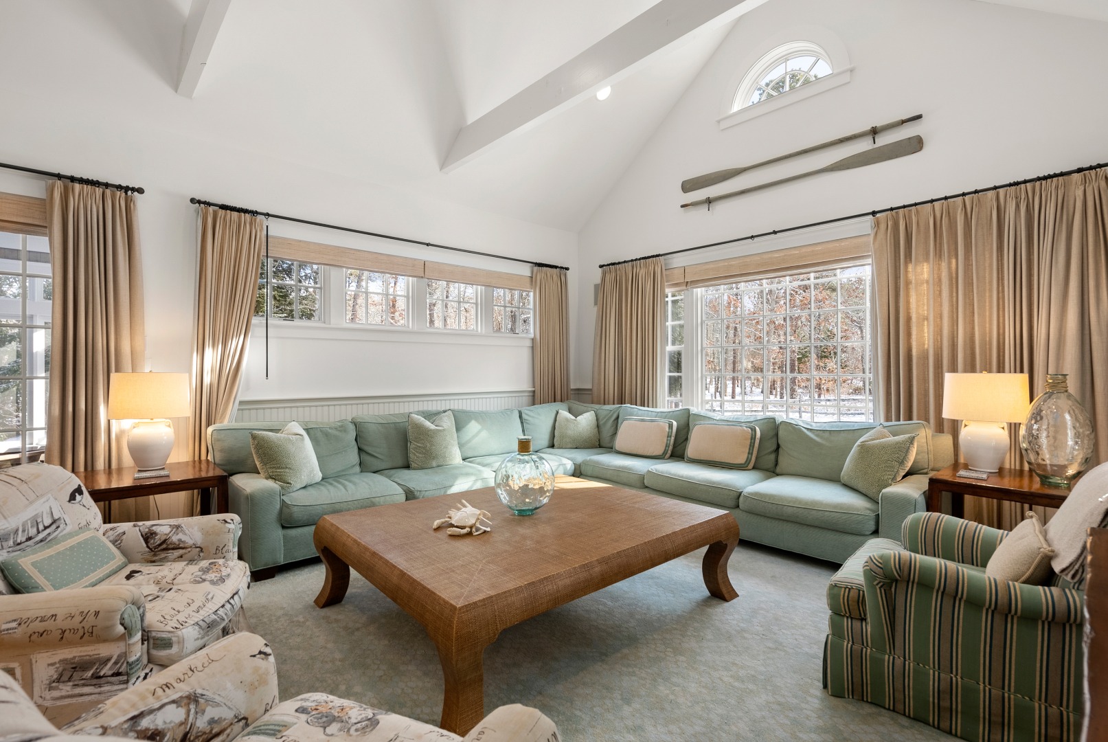 243 Katama Road Edgartown, MA 02539 - Photo 8 of 42 a living room with furniture and a large window