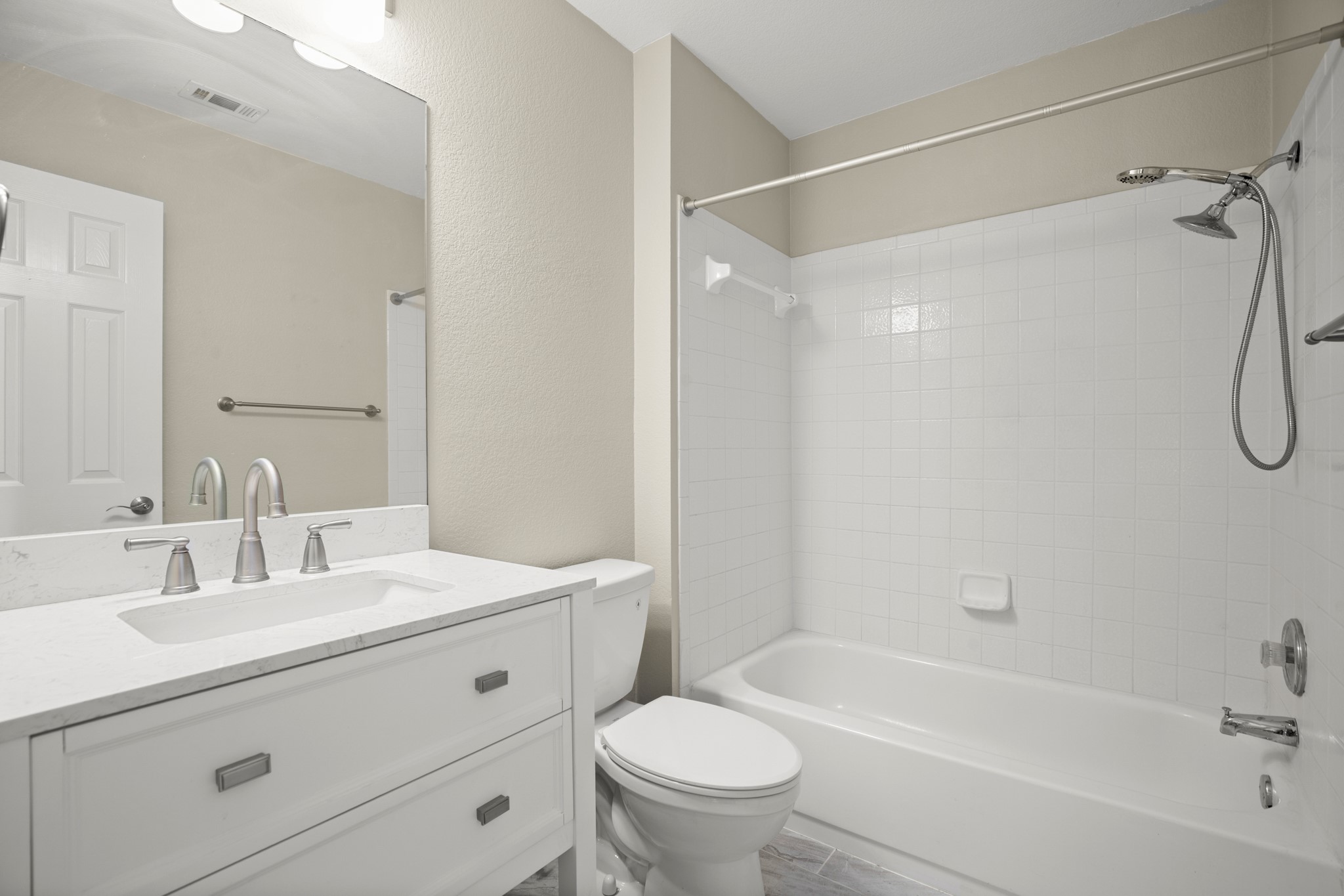 151 Sampson Kyle, TX 78640 - Photo 21 of 23 Updated vanities, neutral finishes, and practical design choices make the bathrooms feel easy to live with long term.