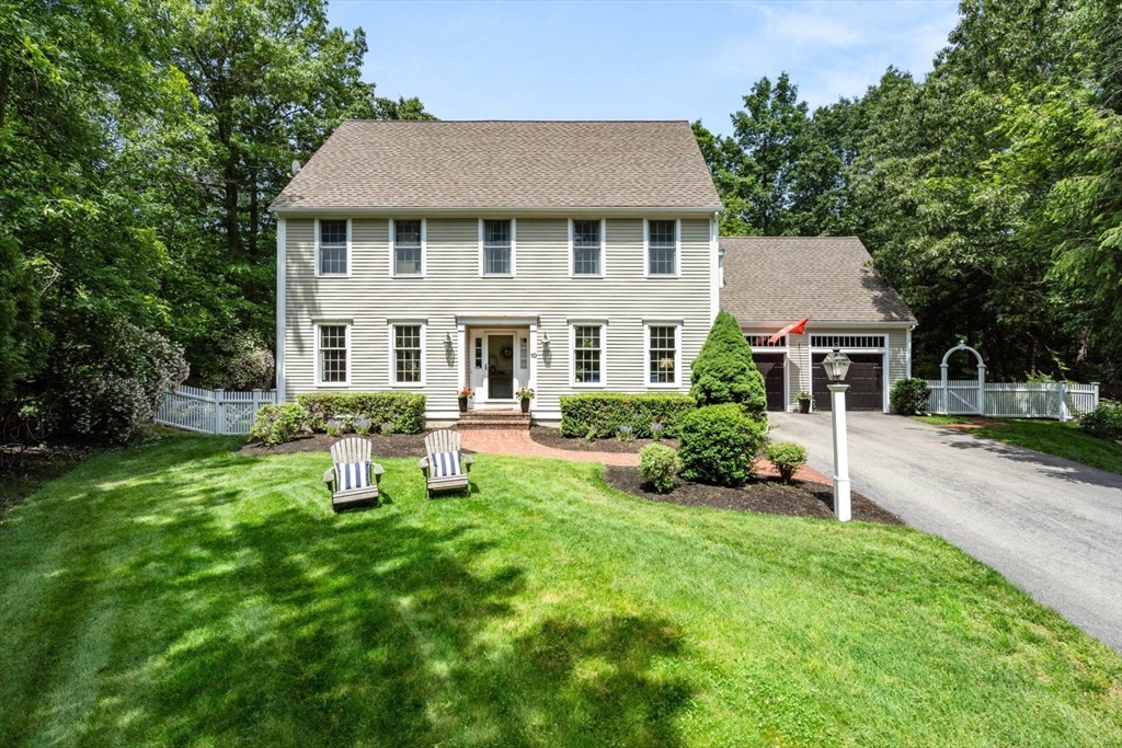 10 Franklin Rodgers Road Hingham, MA 02043 - Photo 1 of 31 a front view of a house with a yard and table and chairs