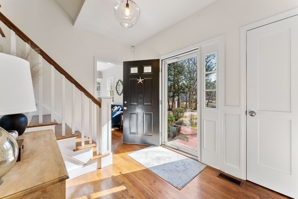 10 Franklin Rodgers Road Hingham, MA 02043 - Photo 13 of 31 a view of entryway and hall with wooden floor