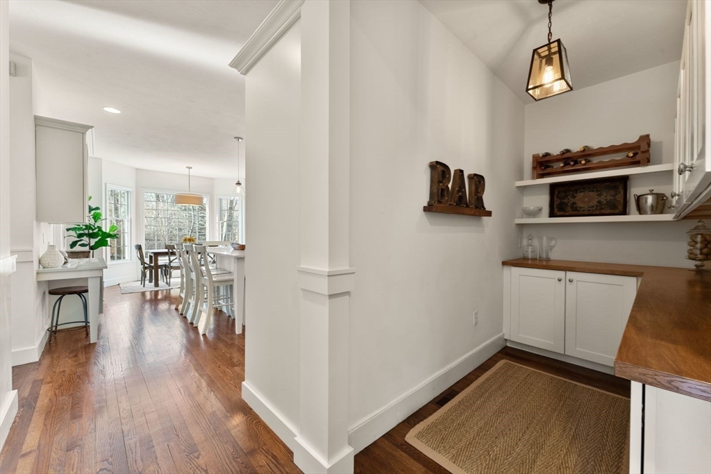 10 Franklin Rodgers Road Hingham, MA 02043 - Photo 15 of 31 a view of a kitchen with furniture wooden floor and a sink