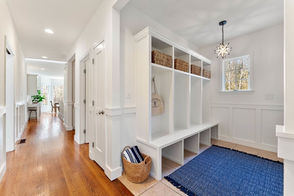 10 Franklin Rodgers Road Hingham, MA 02043 - Photo 16 of 31 a view of entryway with wooden floor and stairs