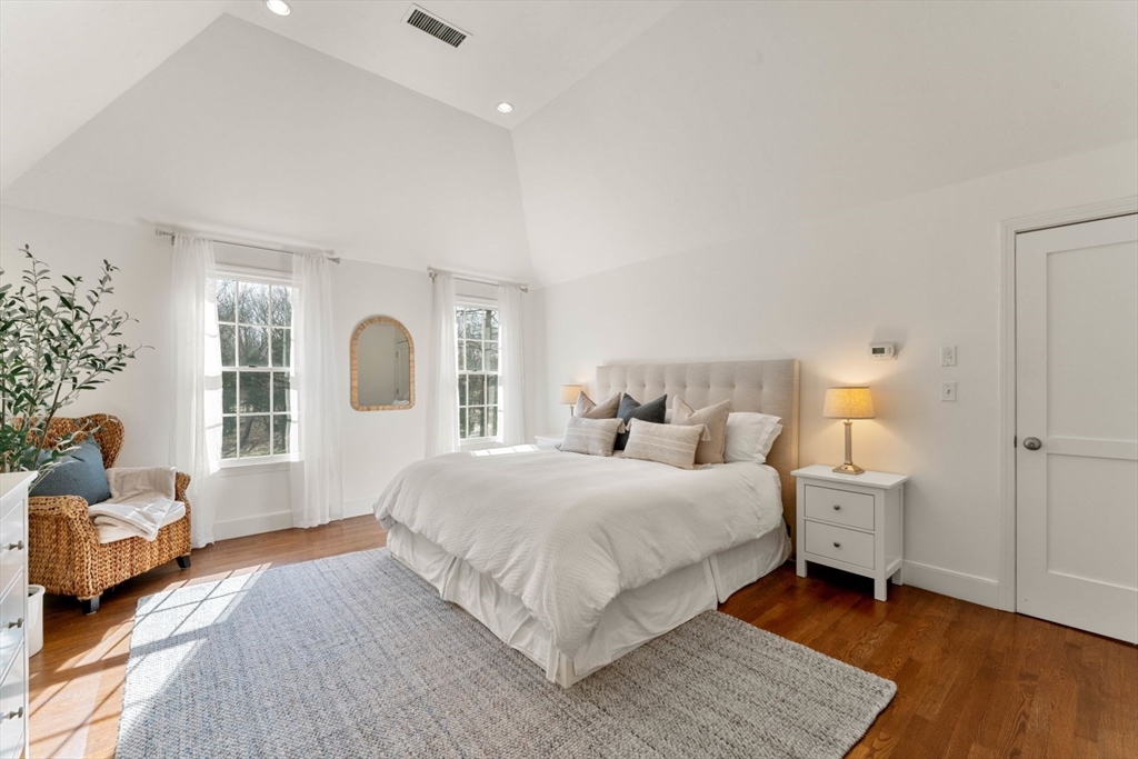 10 Franklin Rodgers Road Hingham, MA 02043 - Photo 18 of 31 a bedroom with a large bed and a window