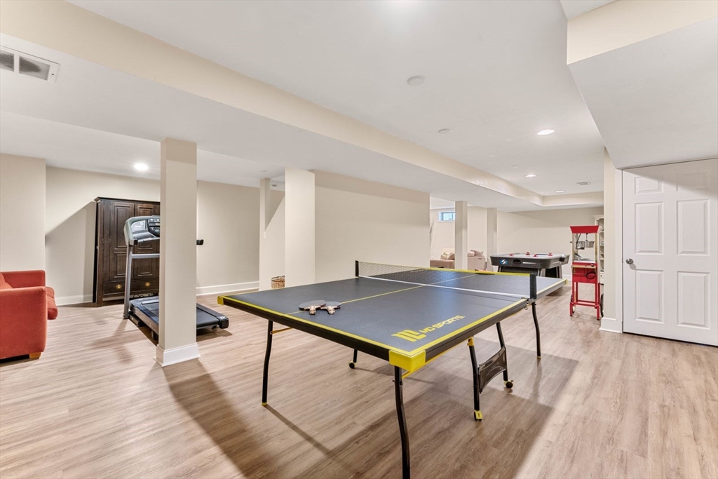 10 Franklin Rodgers Road Hingham, MA 02043 - Photo 27 of 31 a room with stainless steel appliances table tennis table and chairs