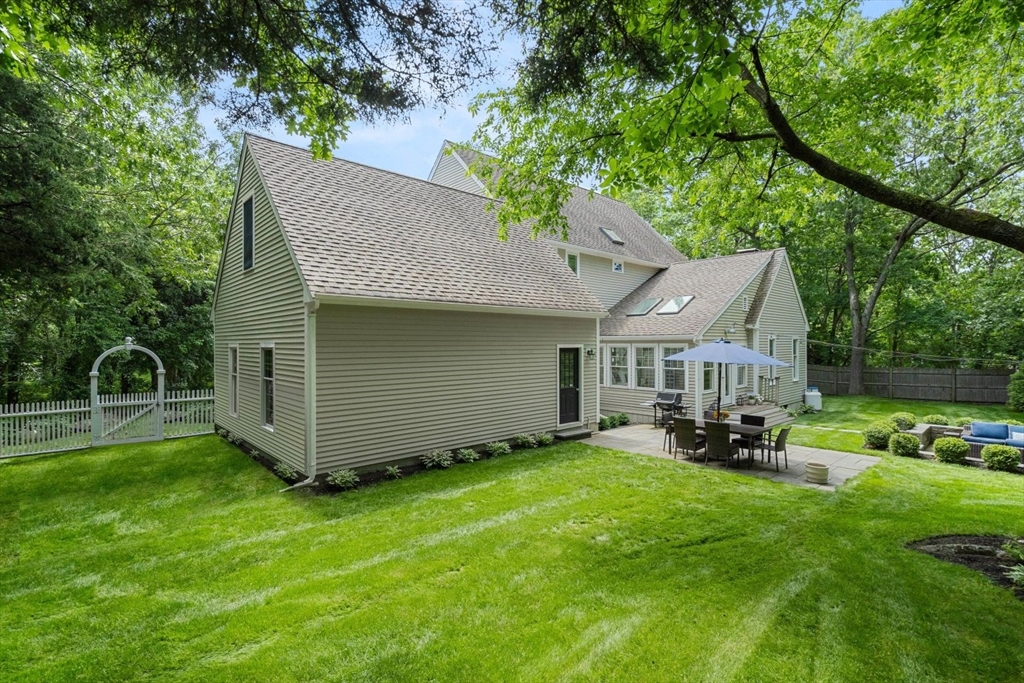 10 Franklin Rodgers Road Hingham, MA 02043 - Photo 30 of 31 a front view of a house with garden