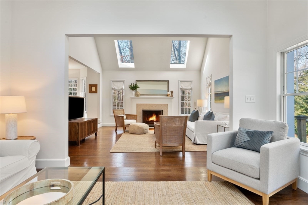10 Franklin Rodgers Road Hingham, MA 02043 - Photo 5 of 31 a living room with furniture and a fireplace