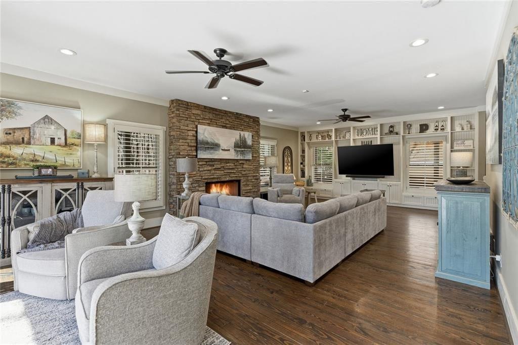 2162 Valley View Drive Jasper, GA 30143 - Photo 11 of 52 a living room with furniture a flat screen tv and a fireplace