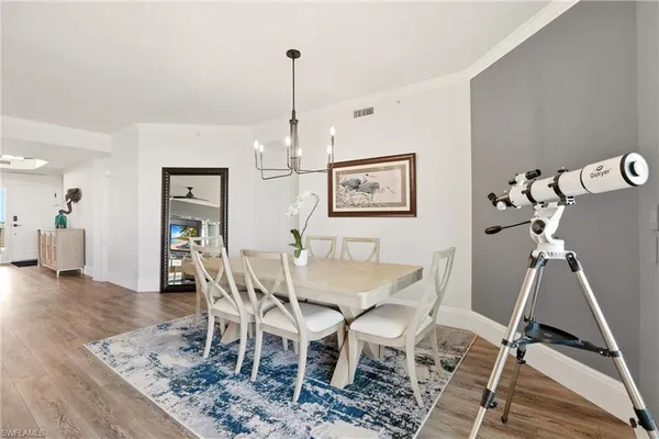 a view of a dining room with furniture