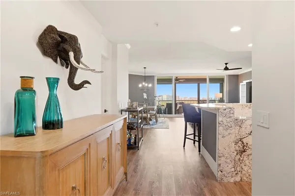 a very nice looking room with a dining table chairs