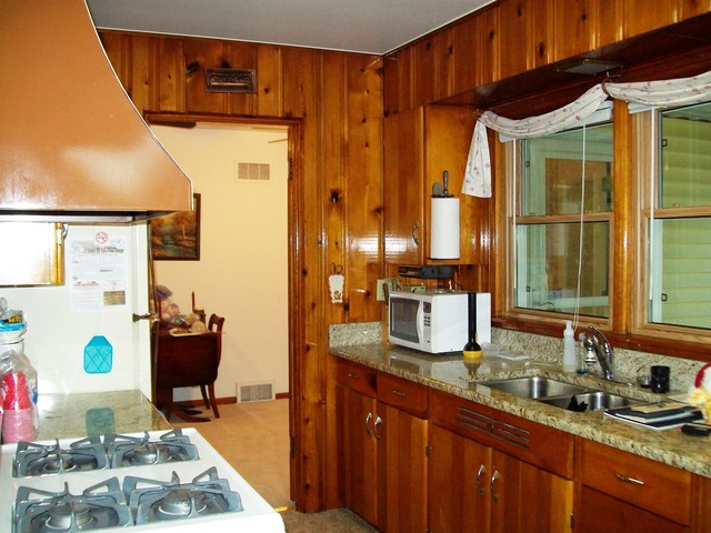 19419 Wolf Road Mokena, IL 60448 - Photo 12 of 19 a bathroom with a granite countertop sink and a mirror
