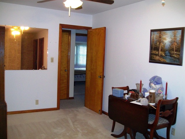 19419 Wolf Road Mokena, IL 60448 - Photo 15 of 19 a dining room with furniture and a chandelier fan
