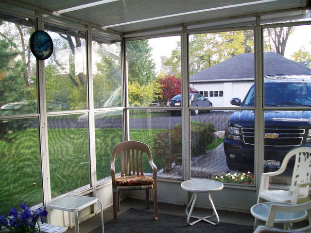 19419 Wolf Road Mokena, IL 60448 - Photo 17 of 19 a view of a porch with chairs and backyard