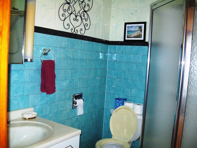 19419 Wolf Road Mokena, IL 60448 - Photo 9 of 19 a bathroom with a toilet sink and mirror