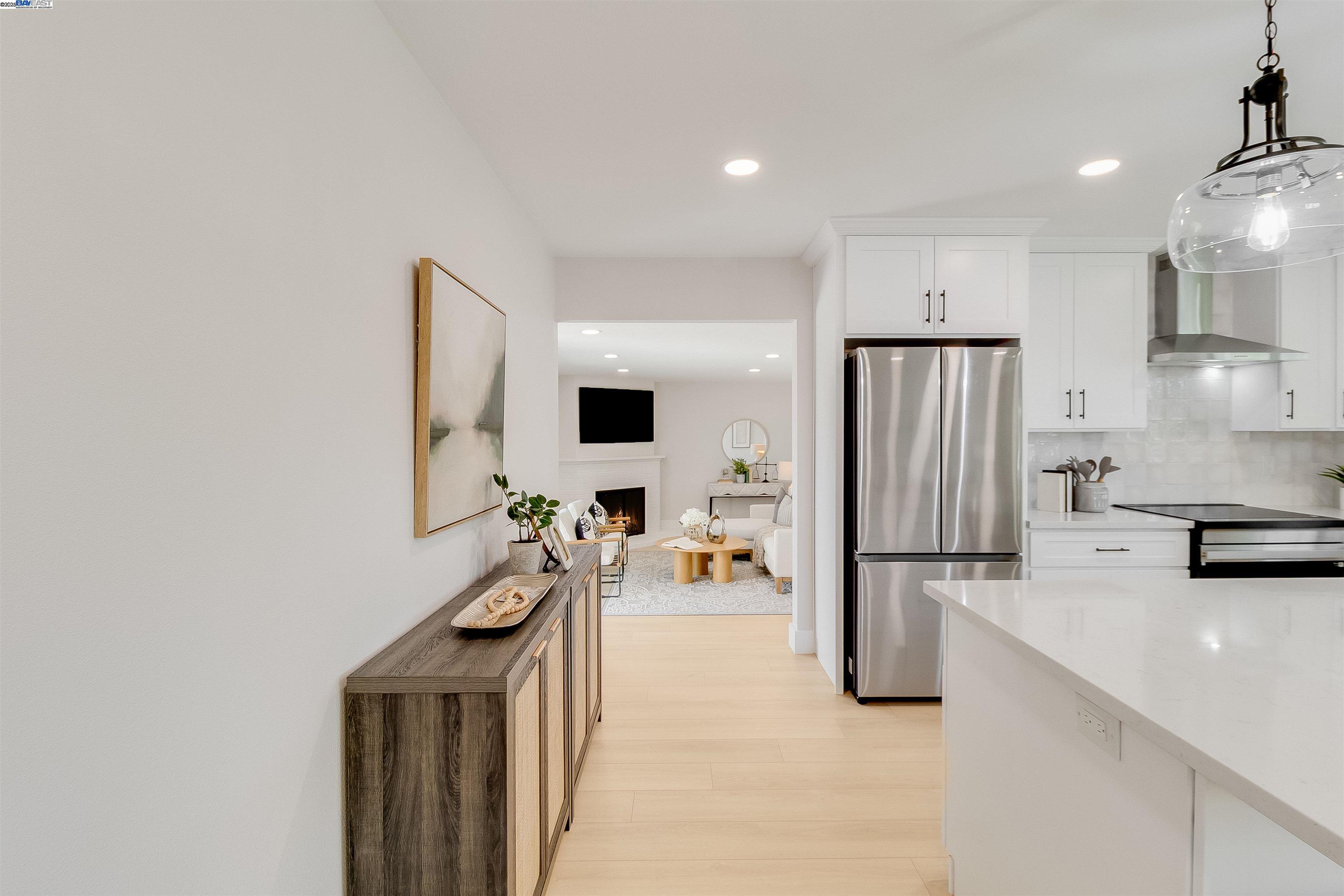 736 Adams Avenue Livermore, CA 94550 - Photo 22 of 52 a kitchen with stainless steel appliances a refrigerator and a sink