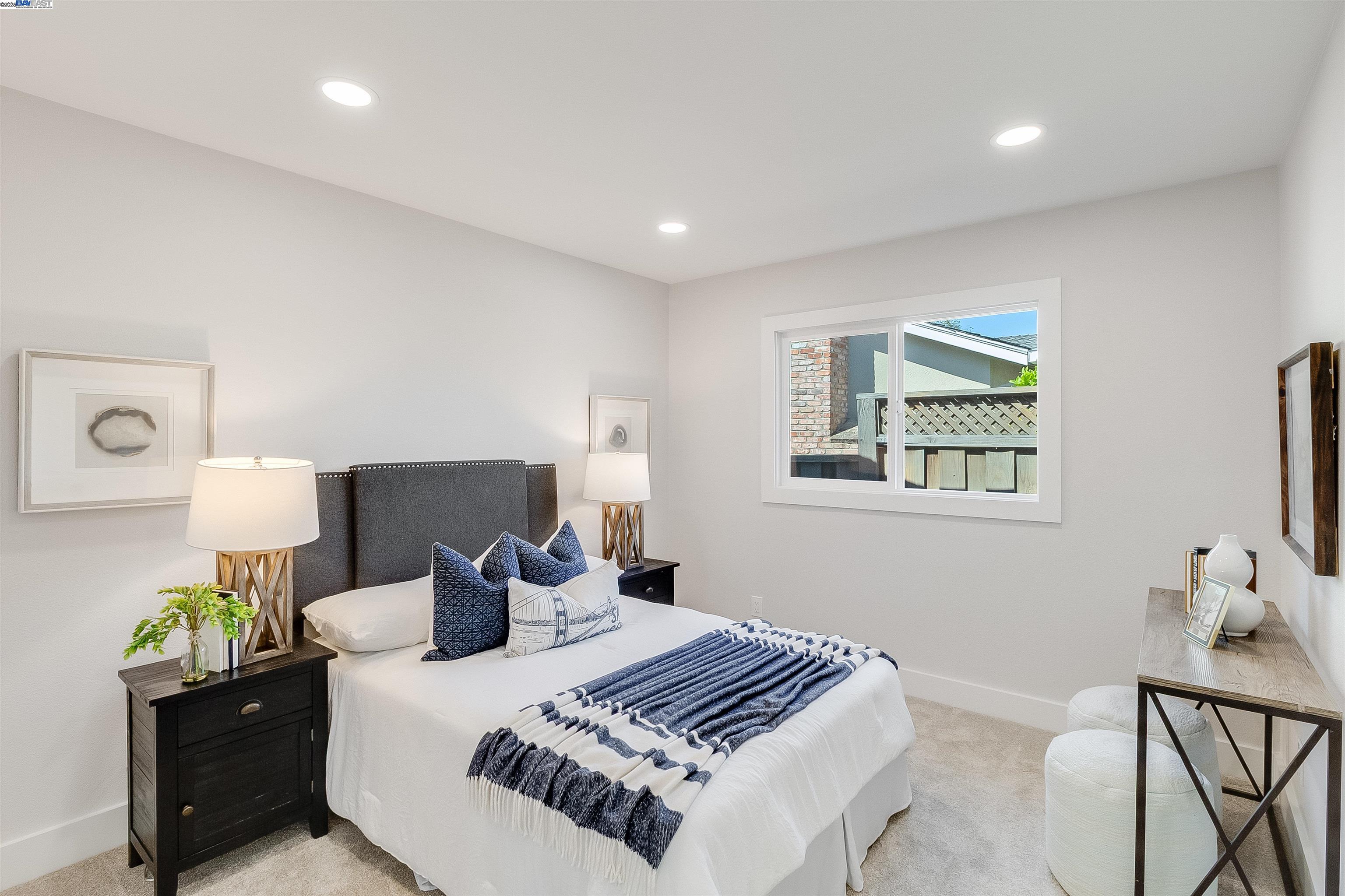 736 Adams Avenue Livermore, CA 94550 - Photo 28 of 52 a bedroom with a bed and window