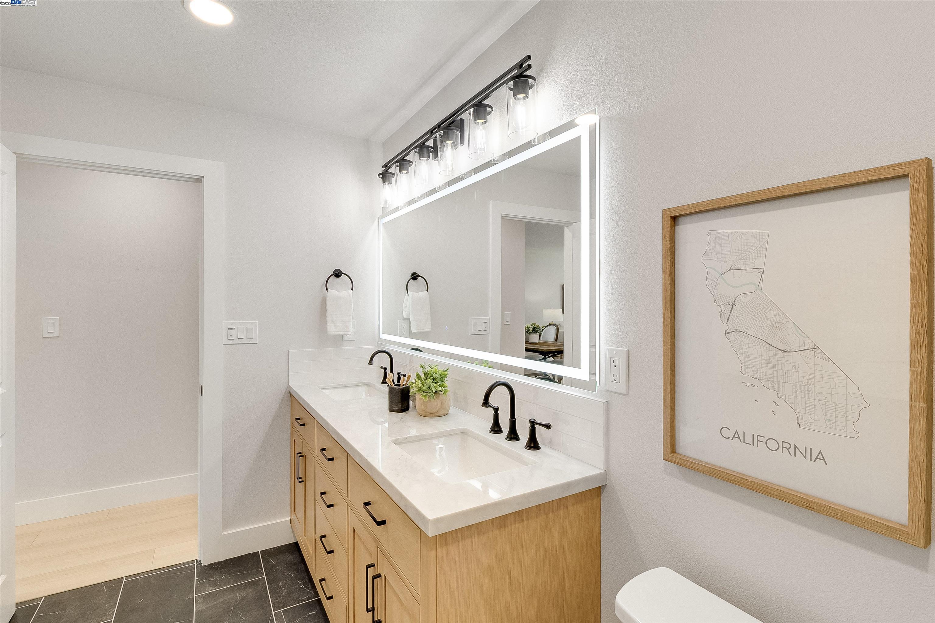 736 Adams Avenue Livermore, CA 94550 - Photo 31 of 52 a bathroom with a sink a toilet and shower