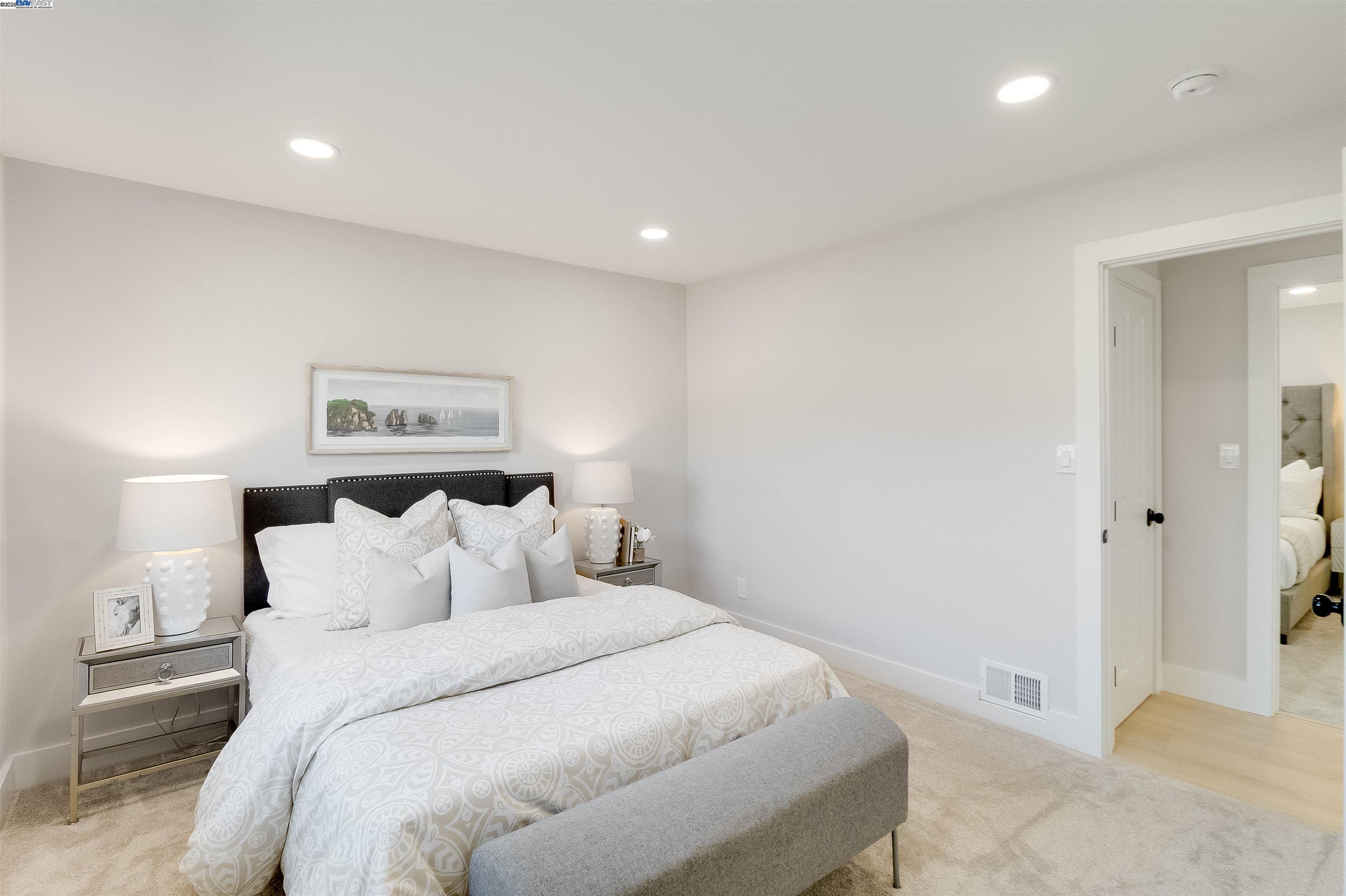 736 Adams Avenue Livermore, CA 94550 - Photo 33 of 52 a bedroom with a bed and a night stand