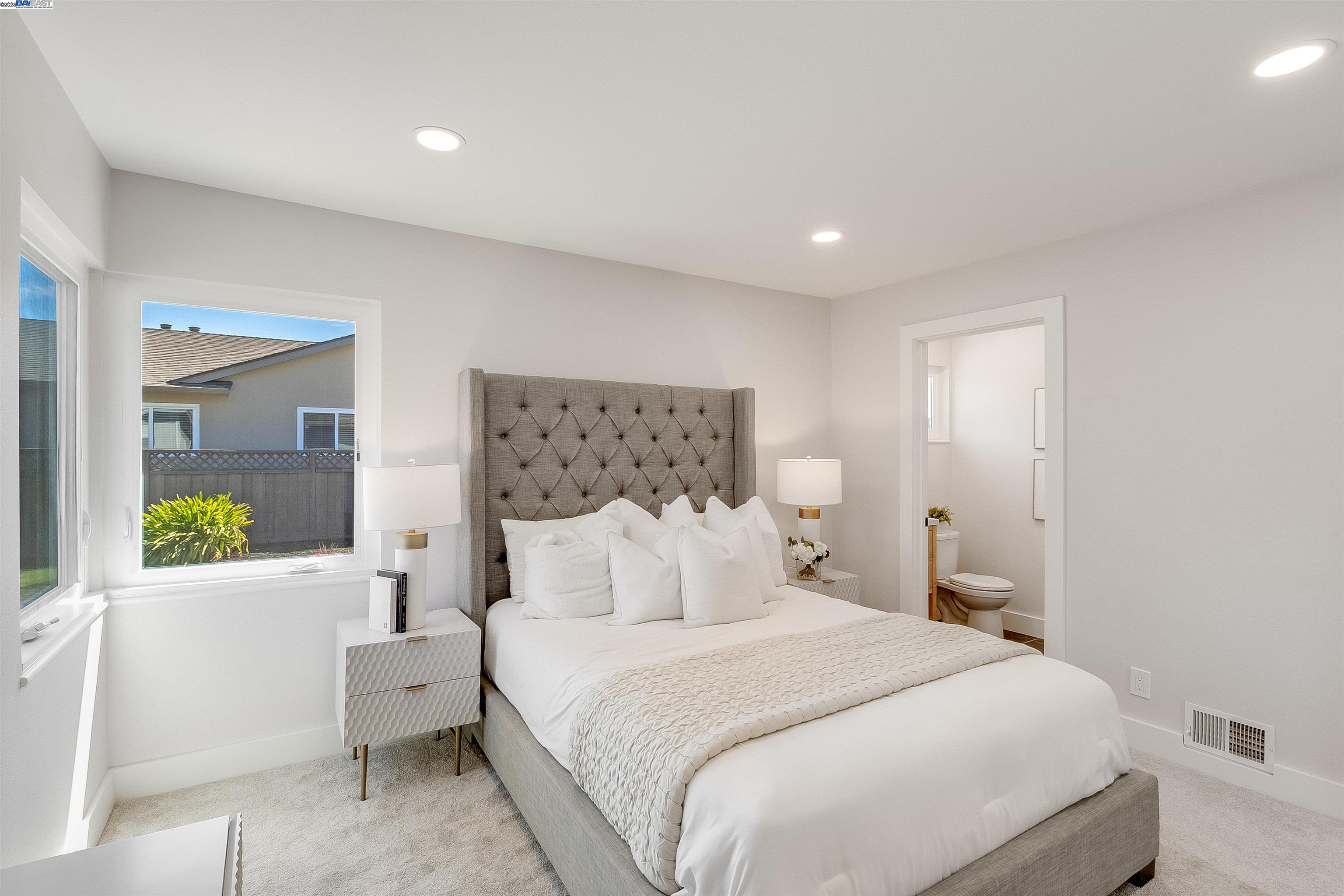 736 Adams Avenue Livermore, CA 94550 - Photo 35 of 52 a bedroom with a bed and a window